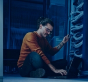 Person sitting with laptop